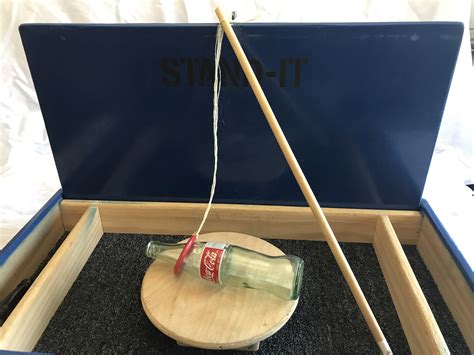 stand bottle up carnival game.